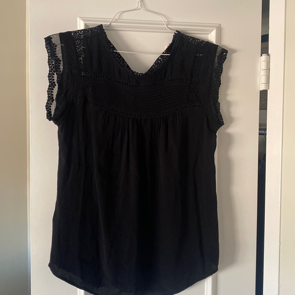 Black sleeveless embroidered blouse